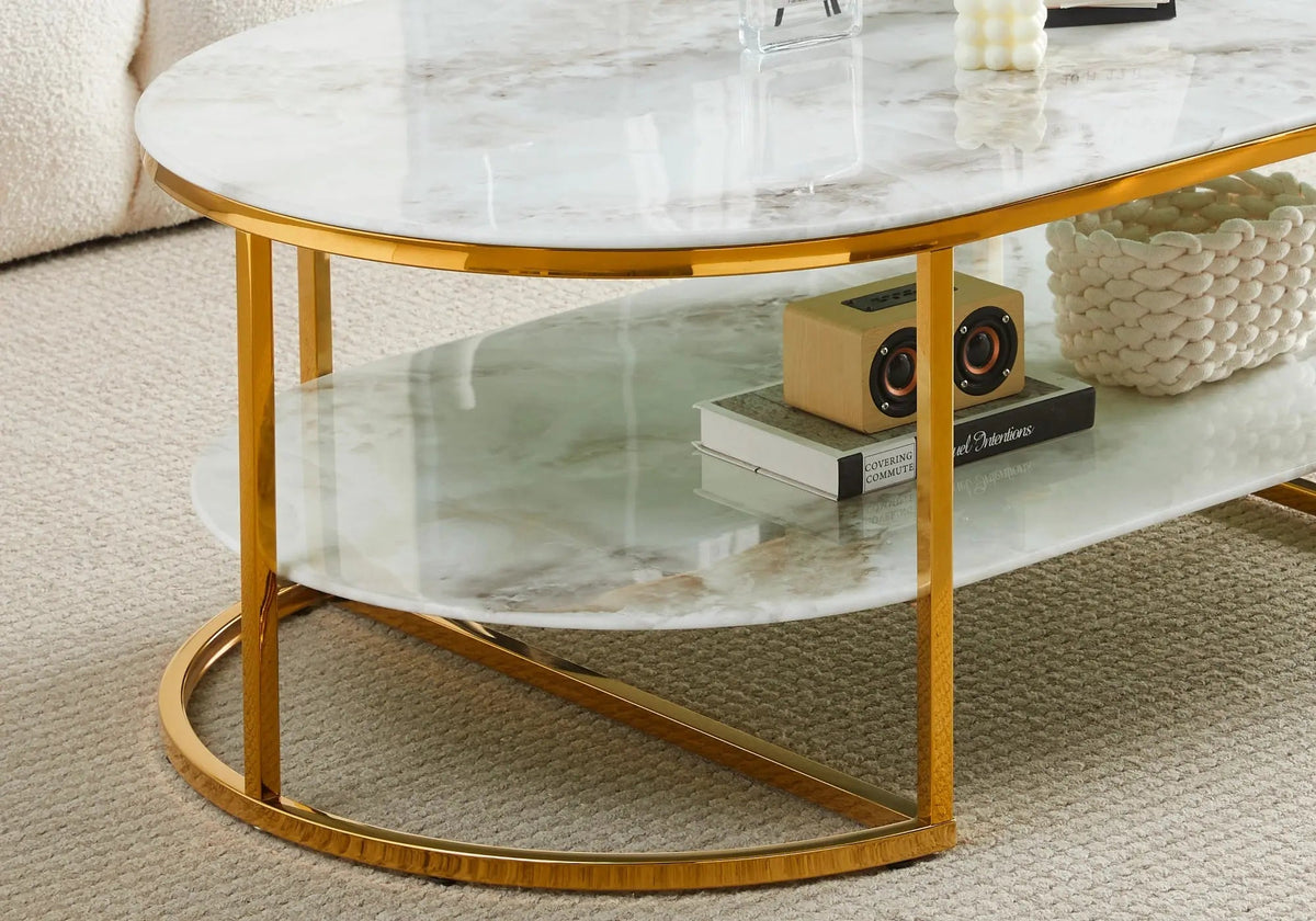 Table basse ovale marbre beige et pieds dorés | Zyro