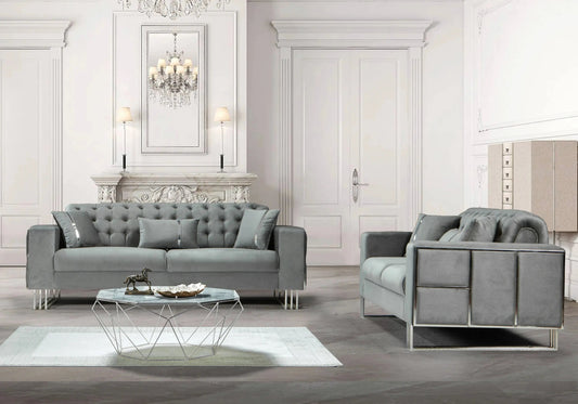 Canapé capitonné en velours gris et métal argenté | Ribella