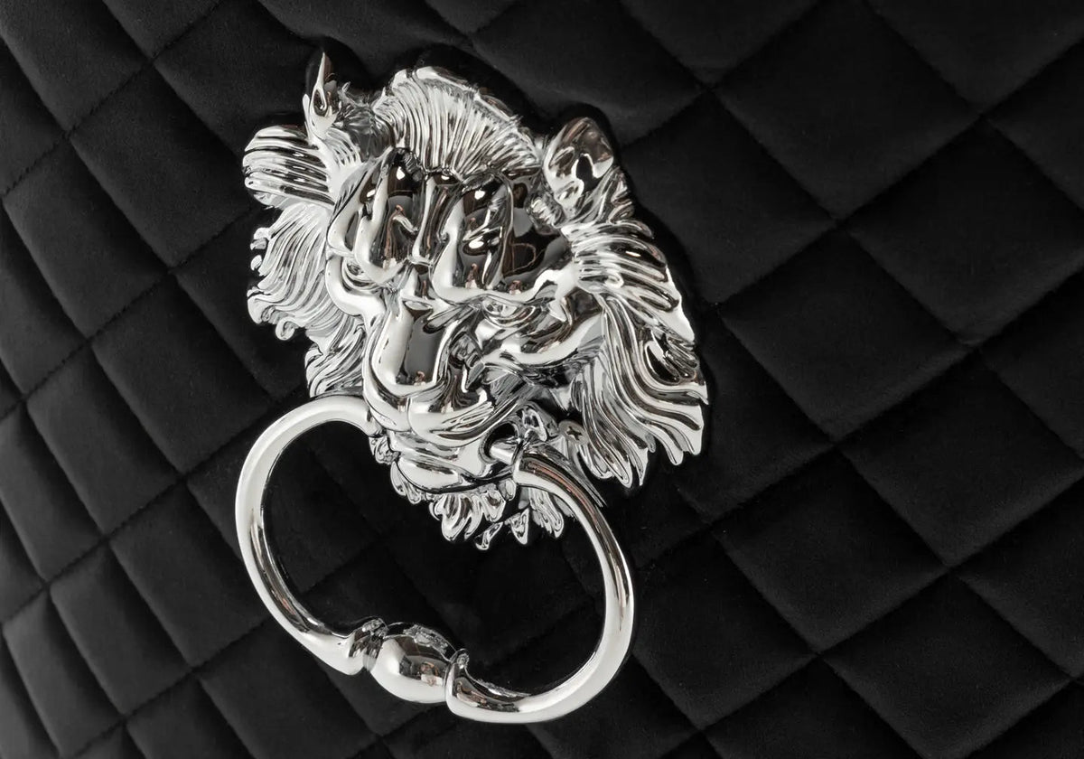 Chaise capitonnée noir tête de lion | Kreo