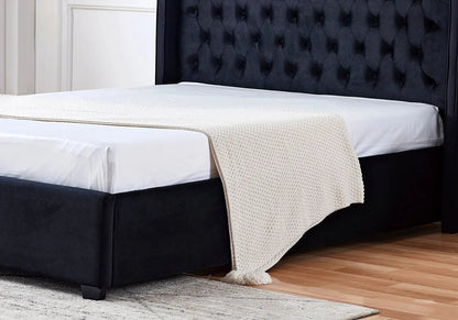 Lit capitonné en noir style chesterfield | Nuvio