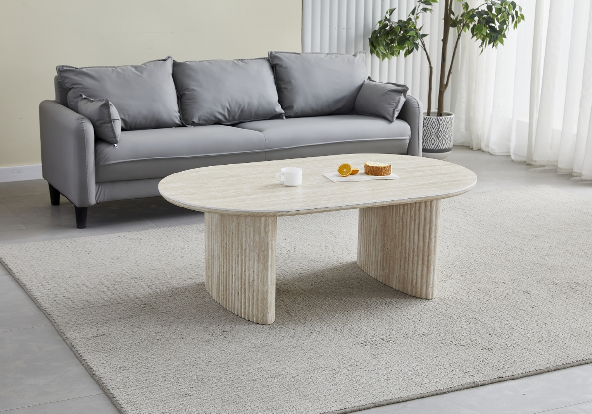 Table basse ovale effet travertin et pieds cannelés | Zivo