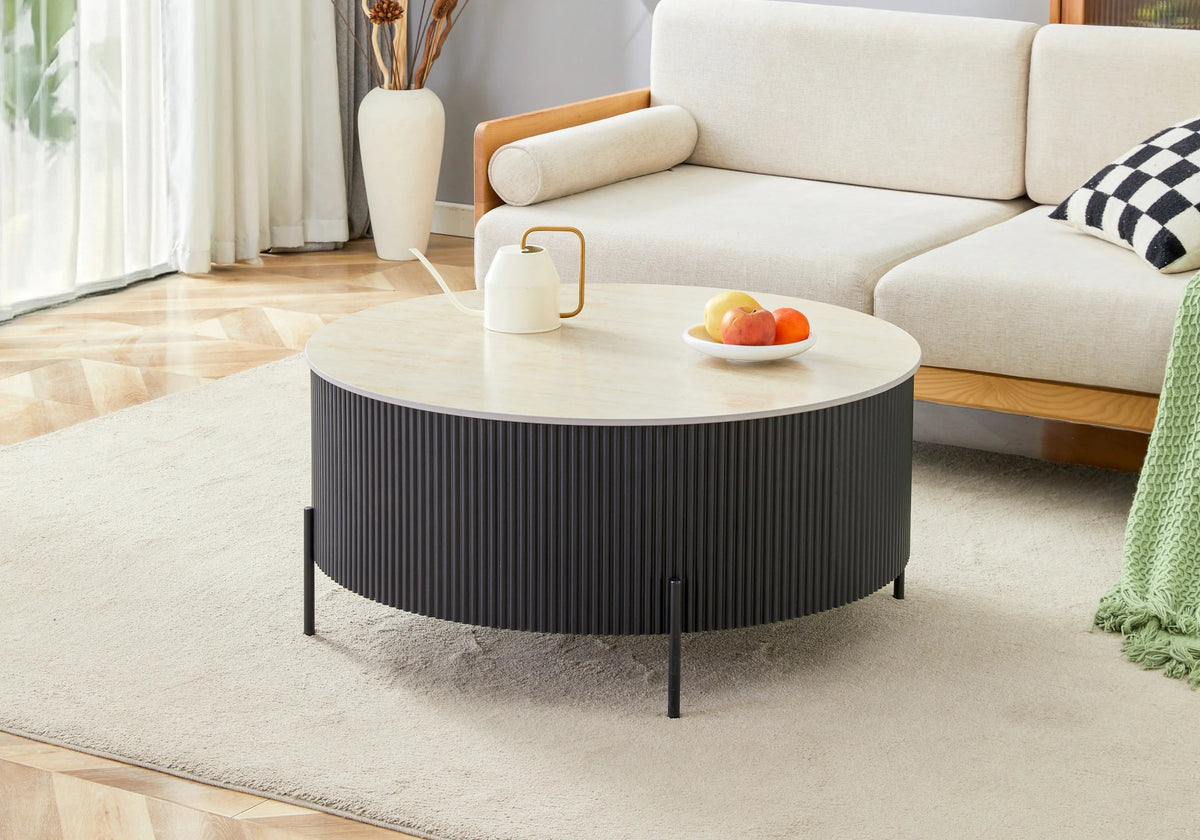 Table basse ronde travertin et pied cannelé noir | Vexto